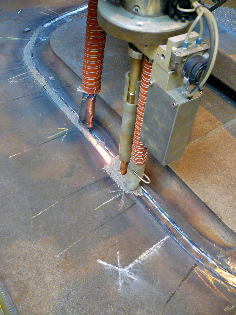 Sistema SA durante il processo di saldatura; il sistema si sposta sui punti di istruzione predefiniti.